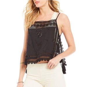 FREE PEOPLE Garden Party cami in black.
Size small. Excellent used condition.